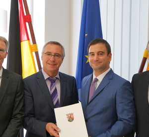 Von links nach rechts: Peter Falk (Leiter Zentralabteilung Innenministerium), Staatssekretär Günter Kern, Marcel Hürter, Dr. Rolf Meier (Leiter Staatsrecht und Gesetzgebung Innenministerium)