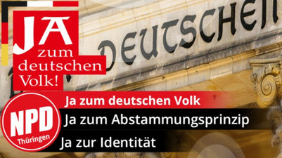NPD-Plakat mit positiver Aussage über das veraltete Abstammungsprinzip und Reichstagsschriftzug